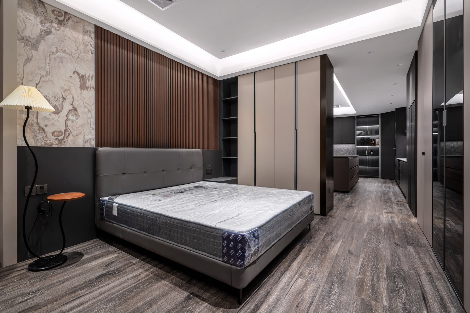 Bedroom with full-height wardrobe and integrated storage